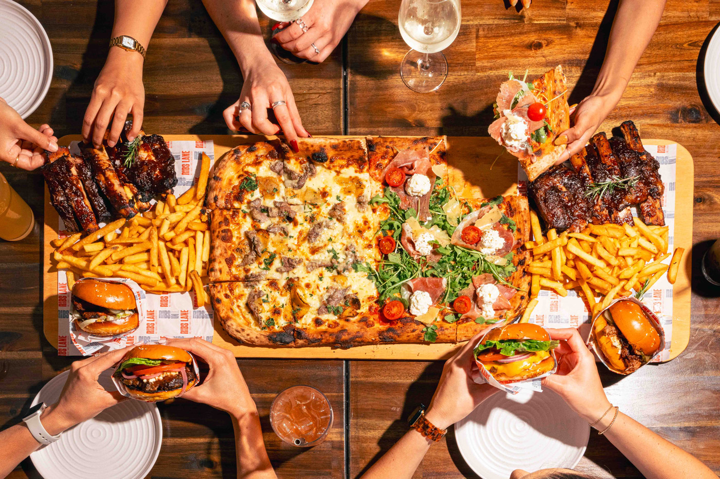 food-platter.jpg,pizza-portrait.jpg,interior-sitting.jpg